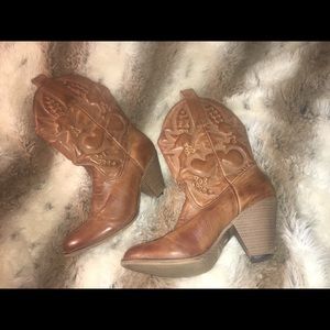 Brown calf high heeled boots